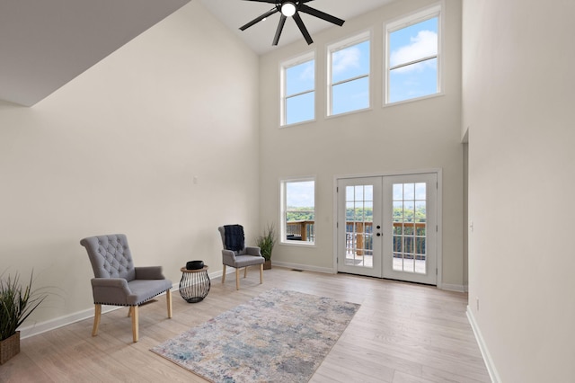 877 Hideaway Dr, Somerset, KY 42503 - living area featuring a high ceiling, ceiling fan, light wood finished floors, baseboards, and french doors