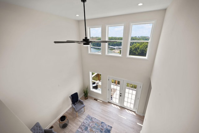 877 Hideaway Dr, Somerset, KY 42503 - unfurnished living room with ceiling fan, french doors, wood finished floors, baseboards, and recessed lighting