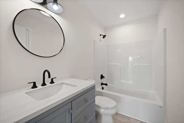 877 Hideaway Dr, Somerset, KY 42503 - bathroom featuring vanity, toilet, shower / washtub combination, and wood finished floors