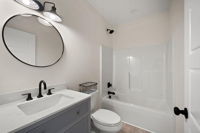 877 Hideaway Dr, Somerset, KY 42503 - bathroom featuring toilet, vanity, tub / shower combination, and wood finished floors