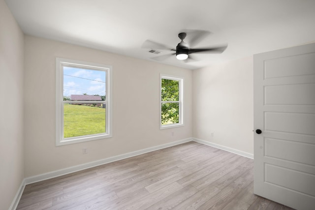 877 Hideaway Dr, Somerset, KY 42503 - unfurnished room with wood finished floors, a ceiling fan, and baseboards