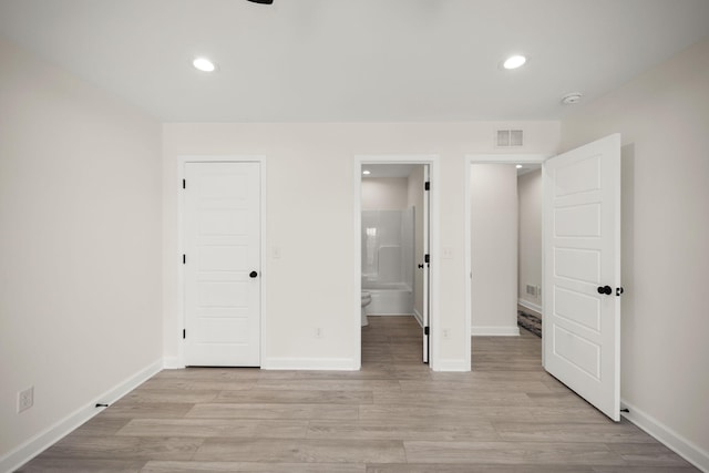 877 Hideaway Dr, Somerset, KY 42503 - unfurnished bedroom with light wood-style flooring, baseboards, recessed lighting, and ensuite bathroom