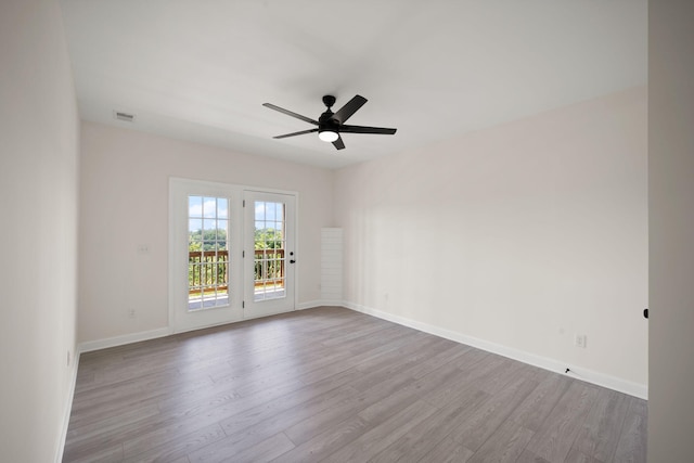 877 Hideaway Dr, Somerset, KY 42503 - unfurnished room with ceiling fan, wood finished floors, and baseboards