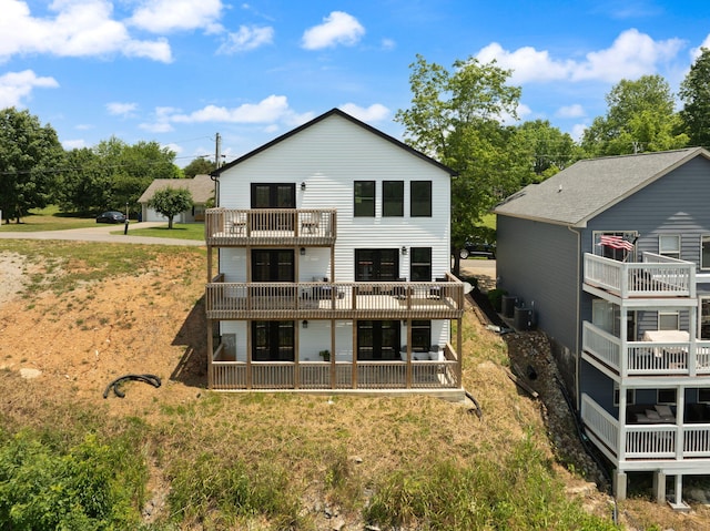 877 Hideaway Dr, Somerset, KY 42503 - rear view of house featuring a balcony, a lawn, and cooling unit