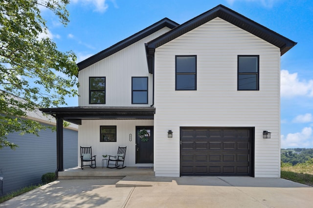 877 Hideaway Dr, Somerset, KY 42503 - view of front of property with a porch, concrete driveway, and a garage