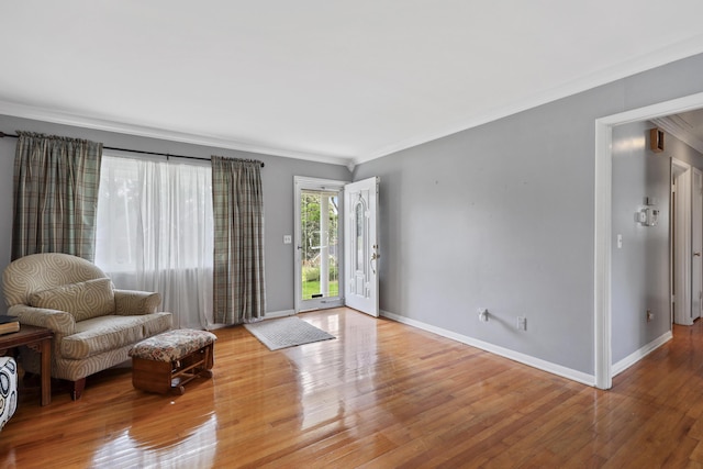 60 Parsons St, Corbin, KY 40701 - sitting room with crown molding, baseboards, and wood finished floors