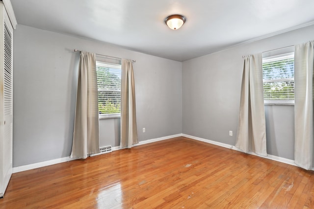 60 Parsons St, Corbin, KY 40701 - unfurnished room with light wood finished floors and baseboards