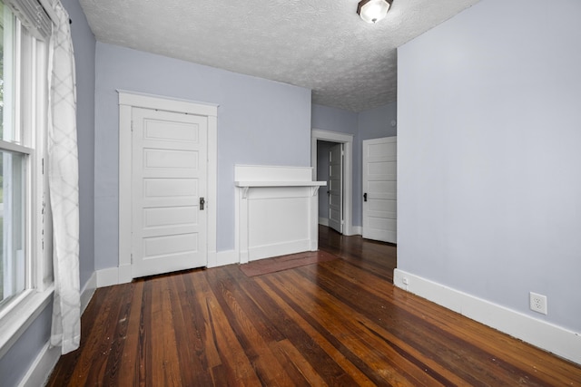 2465 Talmage-Mayo Rd, Harrodsburg, KY 40330 - spare room with baseboards, hardwood / wood-style flooring, healthy amount of natural light, and a textured ceiling