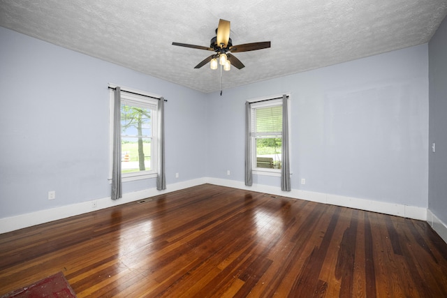 2465 Talmage-Mayo Rd, Harrodsburg, KY 40330 - empty room with hardwood / wood-style flooring, ceiling fan, baseboards, and a textured ceiling