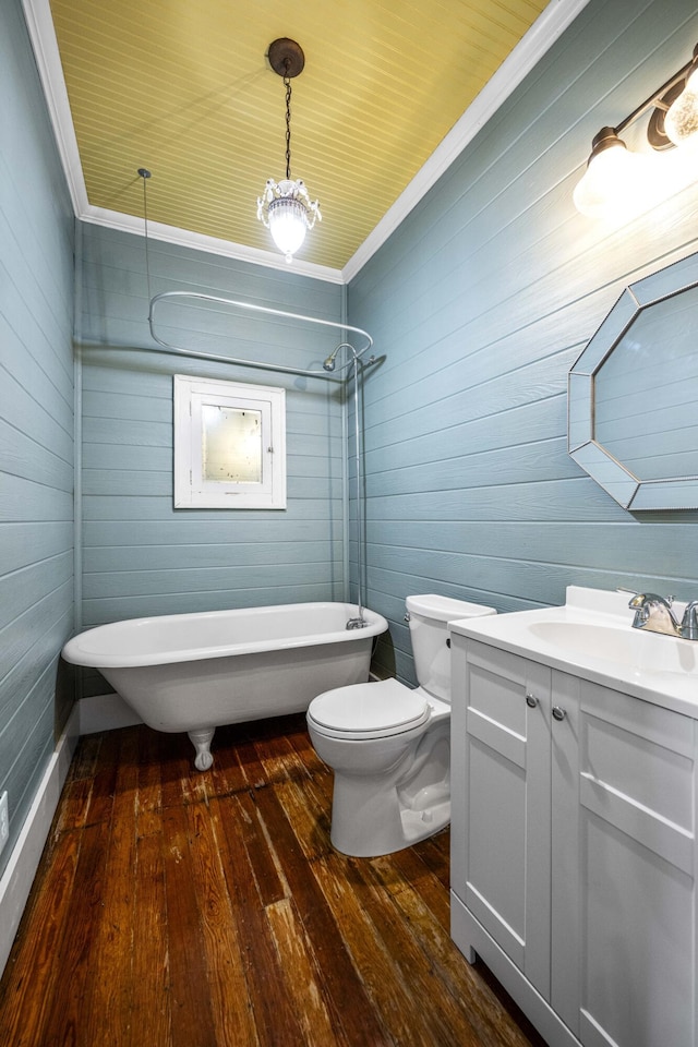 2465 Talmage-Mayo Rd, Harrodsburg, KY 40330 - full bathroom featuring a soaking tub, wood-type flooring, vanity, toilet, and crown molding