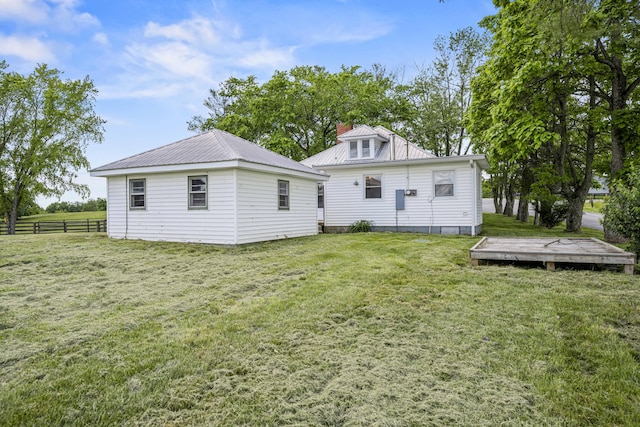 2465 Talmage-Mayo Rd, Harrodsburg, KY 40330 - rear view of property with metal roof, a chimney, and a wooden deck