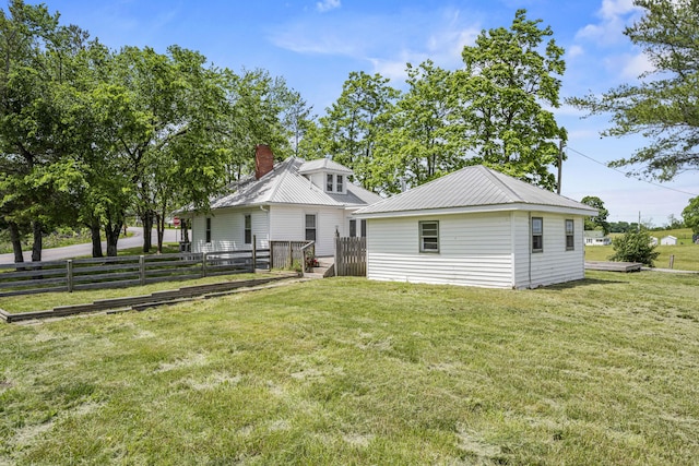 2465 Talmage-Mayo Rd, Harrodsburg, KY 40330 - rear view of property featuring a chimney and metal roof