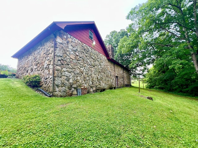 2369 Big Cave Rd, Mount Vernon, KY 40456 - view of property exterior featuring a lawn and stone siding