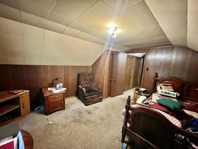 2369 Big Cave Rd, Mount Vernon, KY 40456 - bedroom featuring wood walls, carpet, and lofted ceiling