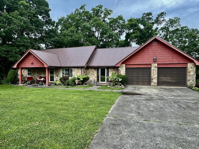 2369 Big Cave Rd, Mount Vernon, KY 40456 - single story home featuring stone siding, an attached garage, and a front yard
