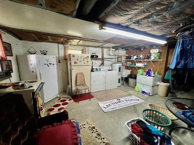 2369 Big Cave Rd, Mount Vernon, KY 40456 - below grade area with washer and dryer, freestanding refrigerator, and a sink