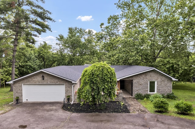 399 Stonecrest Rd, Winchester, KY 40391 - view of front of property featuring driveway, an attached garage, roof with shingles, and covered porch