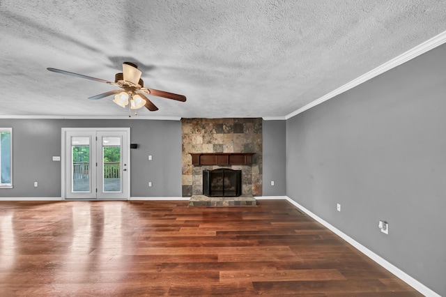 399 Stonecrest Rd, Winchester, KY 40391 - unfurnished living room featuring a textured ceiling, ornamental molding, wood finished floors, ceiling fan, and a large fireplace