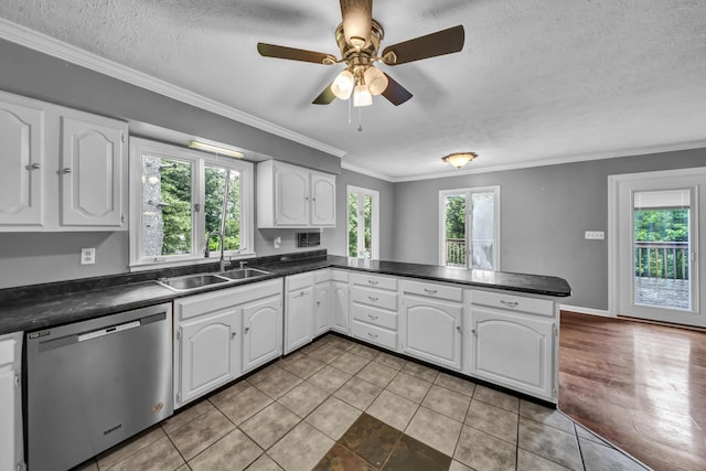 399 Stonecrest Rd, Winchester, KY 40391 - kitchen featuring stainless steel dishwasher, a sink, dark countertops, a peninsula, and white cabinets