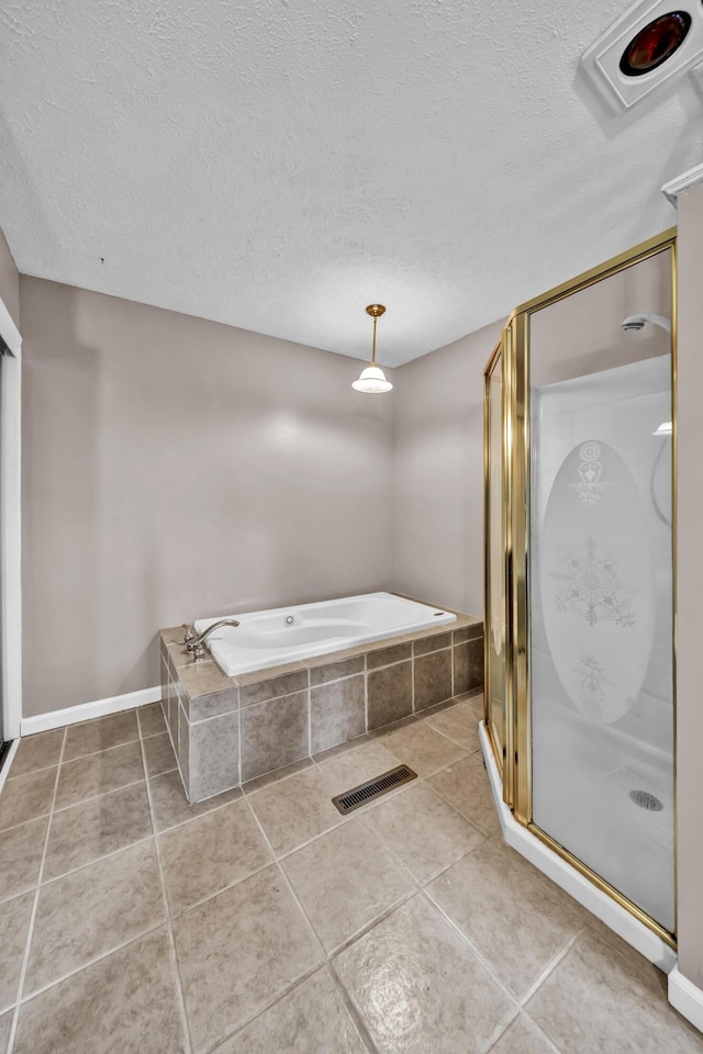 399 Stonecrest Rd, Winchester, KY 40391 - full bath with a bath, a stall shower, a textured ceiling, and tile patterned flooring