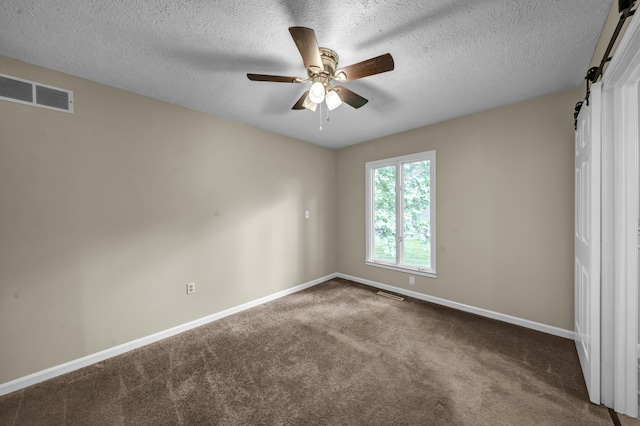 399 Stonecrest Rd, Winchester, KY 40391 - carpeted spare room with baseboards, a ceiling fan, and a textured ceiling