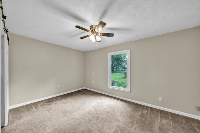 399 Stonecrest Rd, Winchester, KY 40391 - unfurnished room with ceiling fan, carpet flooring, baseboards, and a textured ceiling