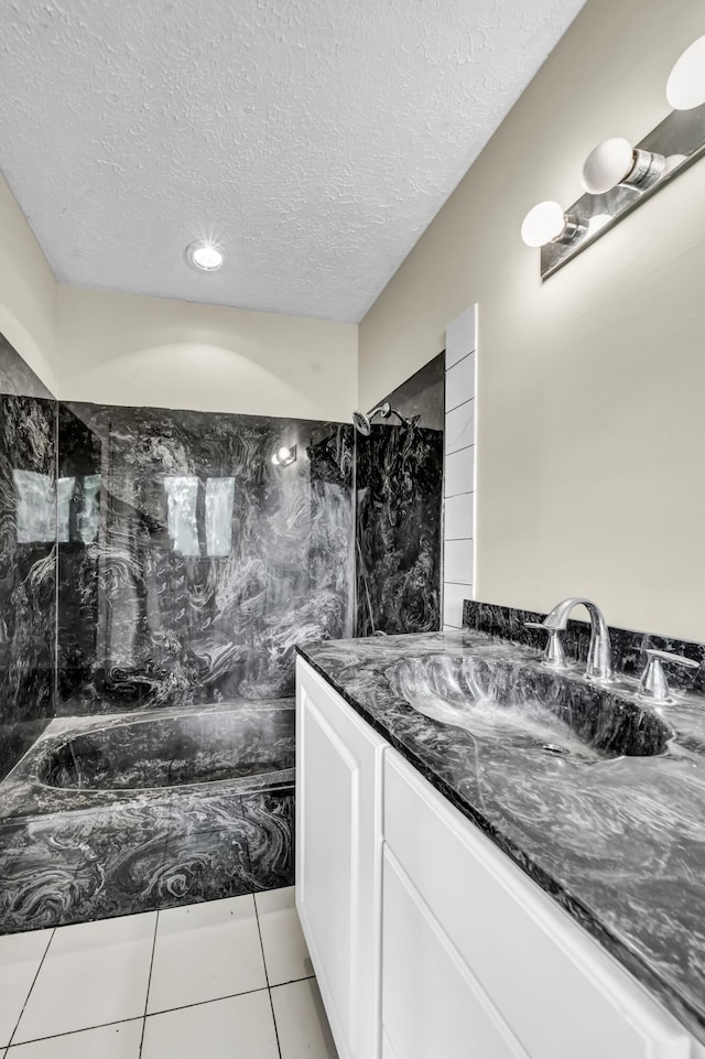 399 Stonecrest Rd, Winchester, KY 40391 - bathroom featuring a marble finish shower, a textured ceiling, vanity, and tile patterned flooring