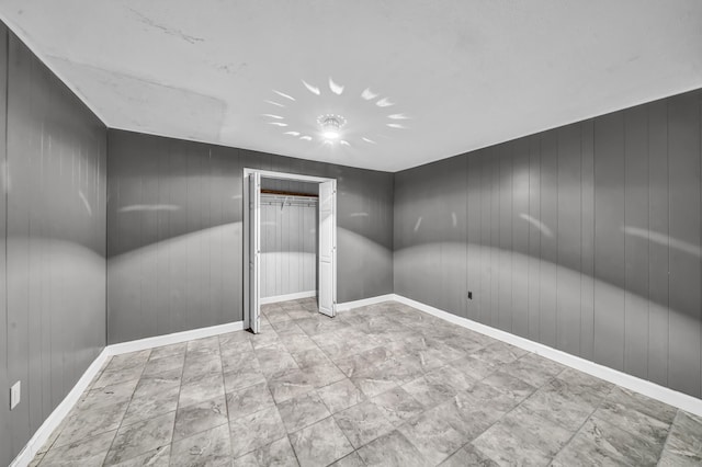 399 Stonecrest Rd, Winchester, KY 40391 - spare room featuring baseboards and wood walls