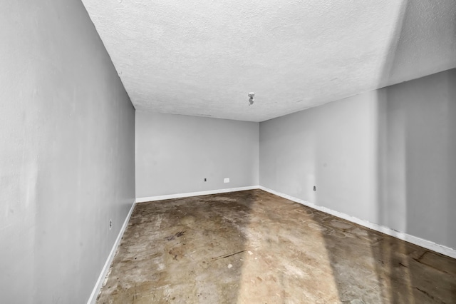 399 Stonecrest Rd, Winchester, KY 40391 - unfurnished room with a textured ceiling, concrete flooring, and baseboards