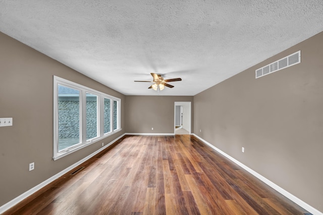 399 Stonecrest Rd, Winchester, KY 40391 - empty room with ceiling fan, wood finished floors, baseboards, and a textured ceiling