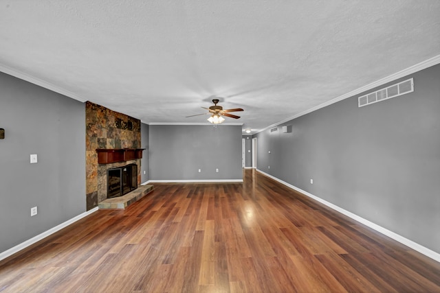 399 Stonecrest Rd, Winchester, KY 40391 - unfurnished living room with a ceiling fan, crown molding, wood finished floors, a fireplace, and baseboards