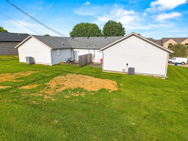 4019 Jodis Way, Somerset, KY 42503 - back of house featuring a lawn and central AC unit