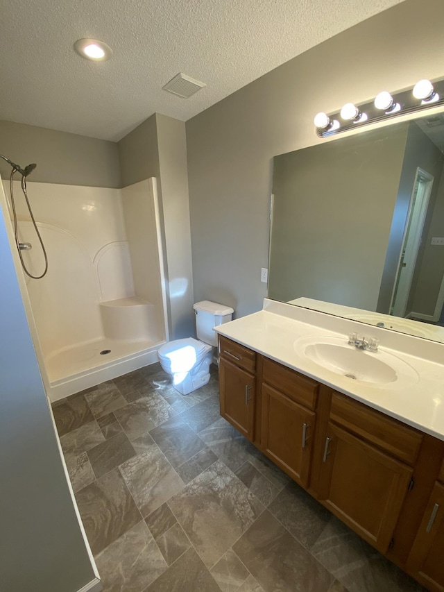 4019 Jodis Way, Somerset, KY 42503 - full bath with a shower, vanity, a textured ceiling, and toilet