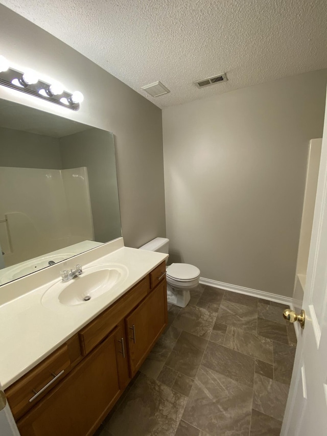 4019 Jodis Way, Somerset, KY 42503 - full bath with vanity, toilet, a shower, and a textured ceiling