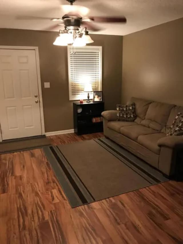 4019 Jodis Way, Somerset, KY 42503 - living room with a ceiling fan, wood finished floors, and baseboards