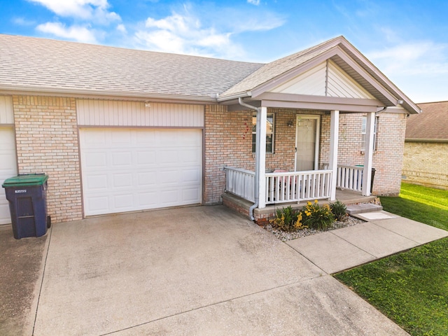 4019 Jodis Way, Somerset, KY 42503 - ranch-style home featuring driveway, a porch, a garage, brick siding, and a shingled roof