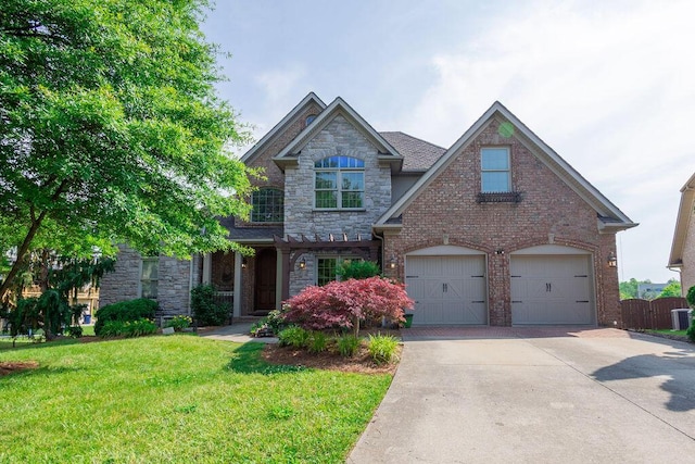 2433 San Milano Pl, Lexington, KY 40509 - craftsman-style home featuring stone siding, driveway, a garage, and brick siding