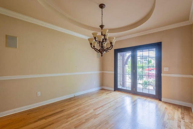 2433 San Milano Pl, Lexington, KY 40509 - empty room featuring a chandelier, wood finished floors, baseboards, and ornamental molding