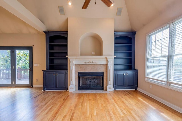 2433 San Milano Pl, Lexington, KY 40509 - unfurnished living room with vaulted ceiling, ceiling fan, wood finished floors, a fireplace, and baseboards