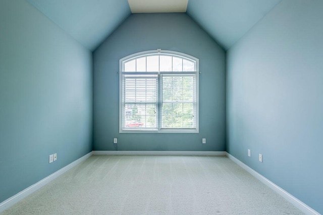 2433 San Milano Pl, Lexington, KY 40509 - carpeted spare room with healthy amount of natural light, lofted ceiling, and baseboards