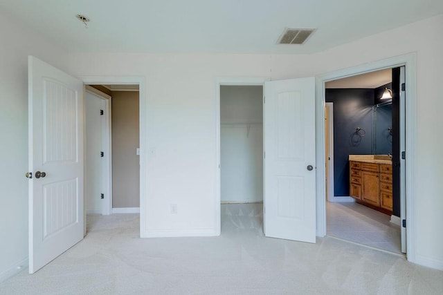 2433 San Milano Pl, Lexington, KY 40509 - unfurnished bedroom featuring carpet flooring, baseboards, a closet, connected bathroom, and a spacious closet
