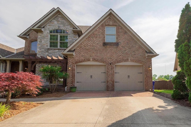 2433 San Milano Pl, Lexington, KY 40509 - view of front of home featuring stone siding, driveway, a garage, a pergola, and a shingled roof