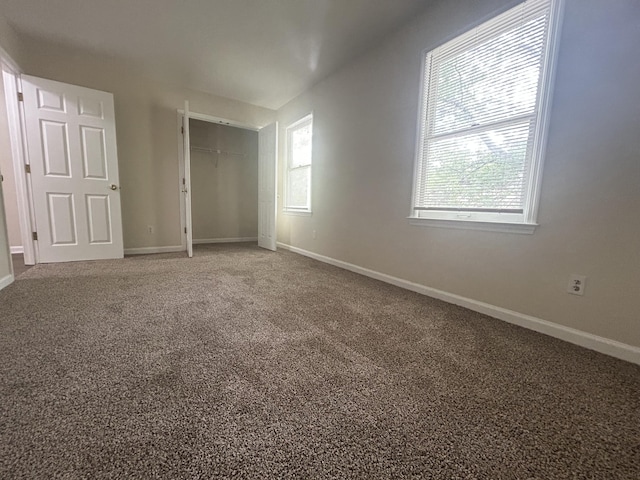 3154 High Ridge Dr, Lexington, KY 40517 - unfurnished bedroom with multiple windows, carpet floors, and baseboards