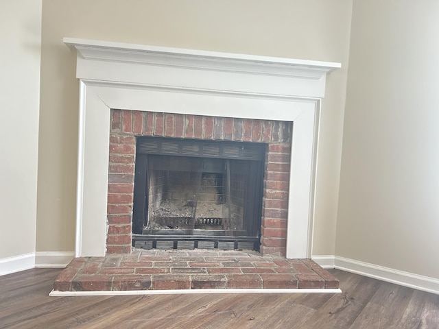 3154 High Ridge Dr, Lexington, KY 40517 - detailed view of baseboards, wood finished floors, and a brick fireplace