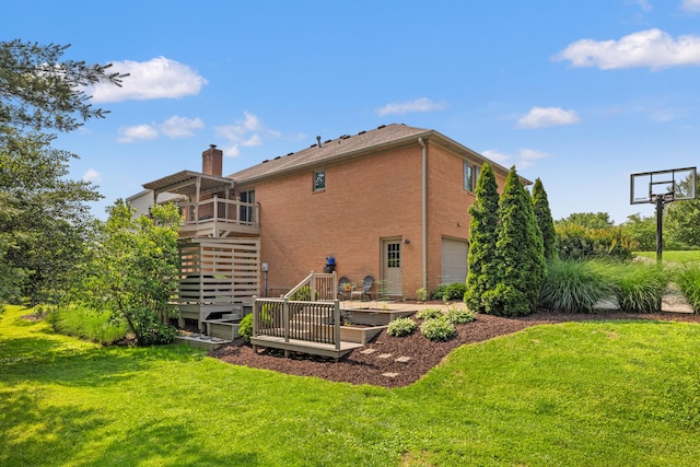 105 Wellington Cv, Danville, KY 40422 - rear view of house featuring a lawn, a chimney, an attached garage, and brick siding