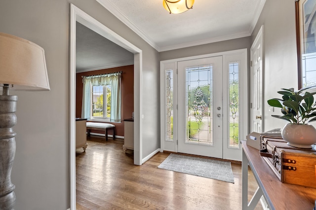 105 Wellington Cv, Danville, KY 40422 - entryway featuring wood finished floors, crown molding, and baseboards