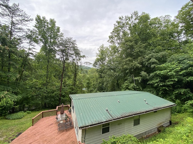 353 Stephens Dr, Somerset, KY 42501 - view of side of home with a wooden deck, metal roof, and a forest view