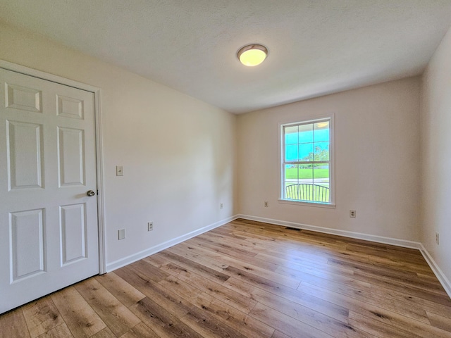 186 Amber Ln, Hustonville, KY 40437 - empty room with wood-type flooring and baseboards