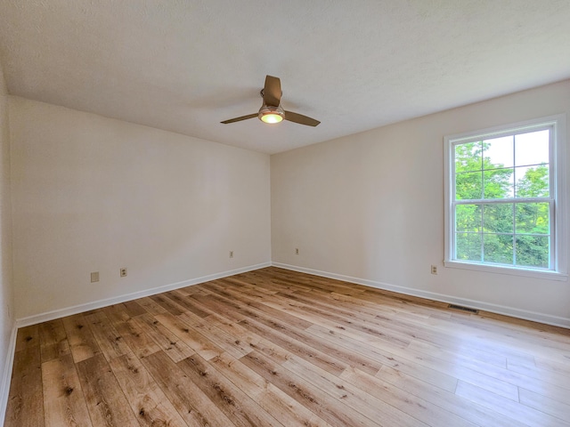 186 Amber Ln, Hustonville, KY 40437 - unfurnished room with hardwood / wood-style floors, baseboards, and ceiling fan