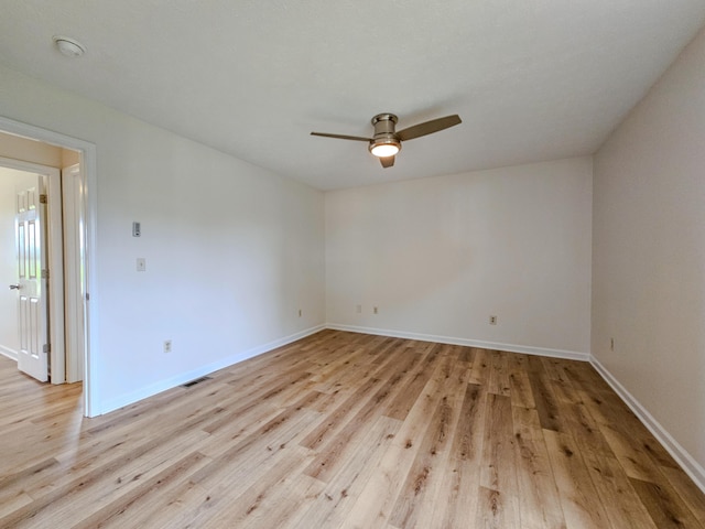 186 Amber Ln, Hustonville, KY 40437 - unfurnished room with ceiling fan, light wood-style floors, baseboards, and a smoke detector